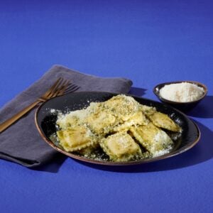 Imported Pecorino Romano Cheese, Grated | Styled